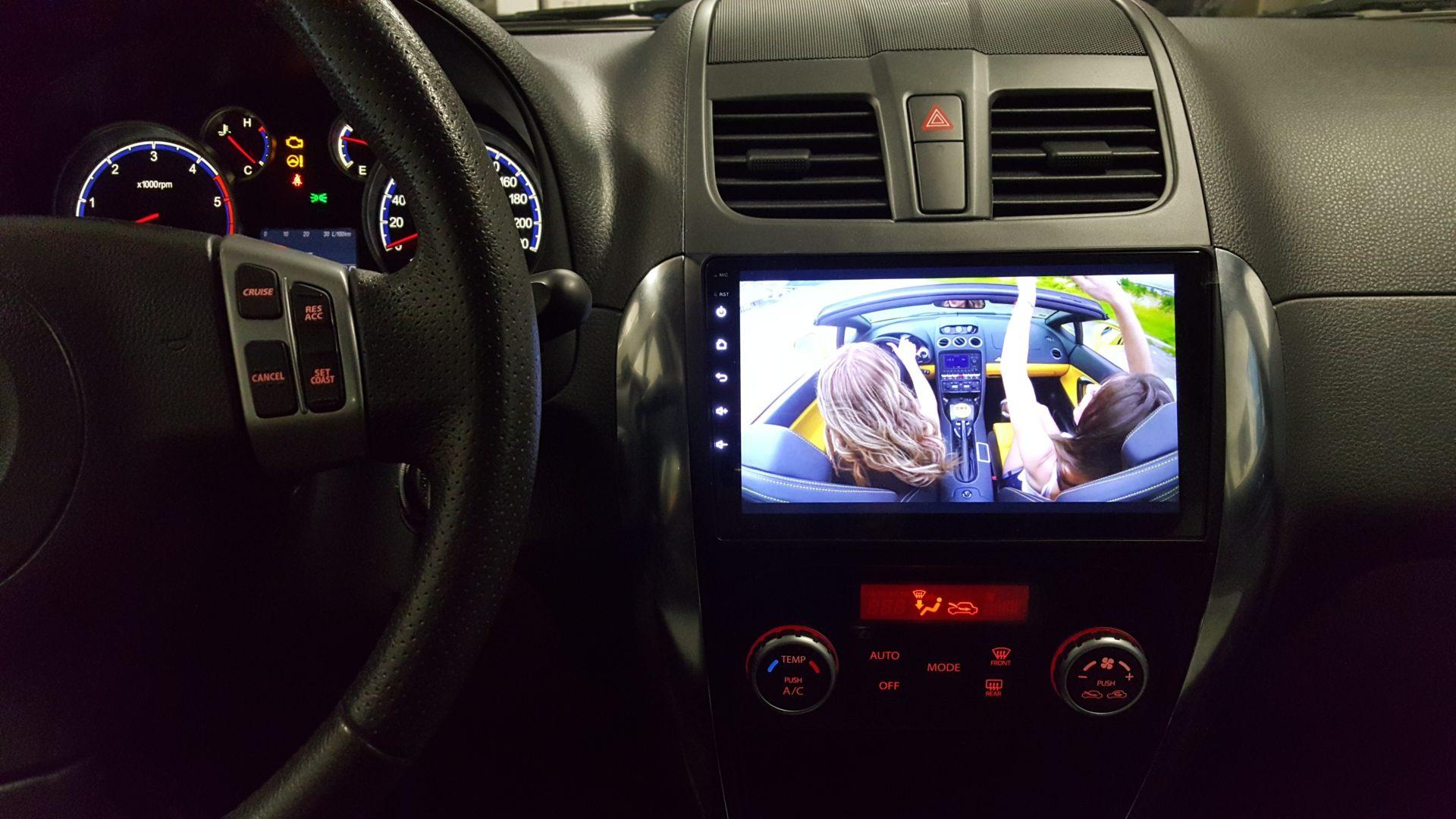 Suzuki SX4: "kitajski" radio, vzvratna kamera in parkirni senzorji 6